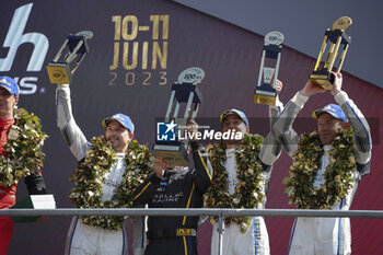 2023-06-11 - 02 BAMBER Earl (nzl), LYNN Alex (gbr), WESTBROOK Richard (gbr), Cadillac Racing, Cadillac V-Series.R, portrait during the podium of the 24 Hours of Le Mans 2023 on the Circuit des 24 Heures du Mans on June 11, 2023 in Le Mans, France - AUTO - LE MANS 2023 - PODIUM - ENDURANCE - MOTORS