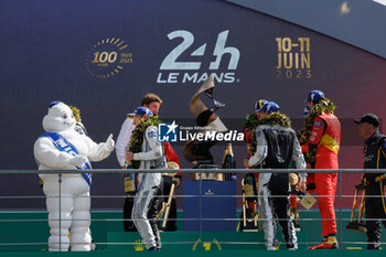 2023-06-11 - 02 BAMBER Earl (nzl), LYNN Alex (gbr), WESTBROOK Richard (gbr), Cadillac Racing, Cadillac V-Series.R, portrait, during the podium of the 24 Hours of Le Mans 2023 on the Circuit des 24 Heures du Mans on June 11, 2023 in Le Mans, France - AUTO - LE MANS 2023 - PODIUM - ENDURANCE - MOTORS