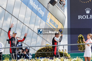 2023-06-11 - 08 BUEMI Sébastien (swi), HARTLEY Brendon (nzl), HIRAKAWA Ryo (jpn), Toyota Gazoo Racing, Toyota GR010 - Hybrid, podium, during the 24 Hours of Le Mans 2023 on the Circuit des 24 Heures du Mans from June 10 to 11, 2023 in Le Mans, France - AUTO - LE MANS 2023 - PART 3 - ENDURANCE - MOTORS