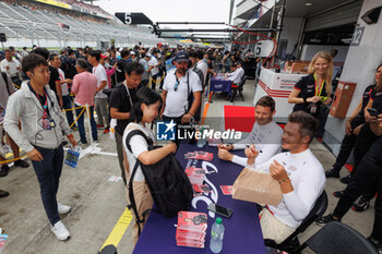 2023-09-09 - LOTTERER André (ger), Porsche Penske Motorsport, Porsche 963, portrait Autograph session, ambiance, during the 6 Hours of Fuji 2023, 6th round of the 2023 FIA World Endurance Championship, from September 7 to 10, 2023 on the Fuji Speedway, in Oyama, Japan - AUTO - FIA WEC - 6 HOURS OF FUJI 2023 - ENDURANCE - MOTORS