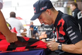 2023-09-09 - BUEMI Sébastien (swi), Toyota Gazoo Racing, Toyota GR010 - Hybrid, portrait Autograph session, ambiance, during the 6 Hours of Fuji 2023, 6th round of the 2023 FIA World Endurance Championship, from September 7 to 10, 2023 on the Fuji Speedway, in Oyama, Japan - AUTO - FIA WEC - 6 HOURS OF FUJI 2023 - ENDURANCE - MOTORS