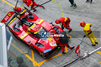 2023-09-10 - 50 FUOCO Antonio (ita), MOLINA Miguel (spa), NIELSEN Nicklas (dnk), Ferrari AF Corse, Ferrari 499P, action pitstop during the 6 Hours of Fuji 2023, 6th round of the 2023 FIA World Endurance Championship, from September 7 to 10, 2023 on the Fuji Speedway, in Oyama, Japan - AUTO - FIA WEC - 6 HOURS OF FUJI 2023 - ENDURANCE - MOTORS