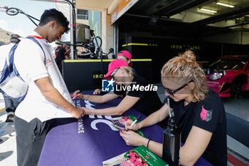 2023-11-04 - 85 BOVY Sarah (bel), GATTING Michelle (dnk), FREY Rahel (swi), Iron Dames, Porsche 911 RSR - 19, AUTOGRAPH SESSION during the Bapco Energies WEC 8 Hours of Bahrain 2023, 7th round of the 2023 FIA World Endurance Championship, from November 1 to 4, 2023 on the Bahrain International Circuit, in Sakhir, Bahrain - AUTO - FIA WEC - 8 HOURS OF BAHRAIN 2023 - ENDURANCE - MOTORS