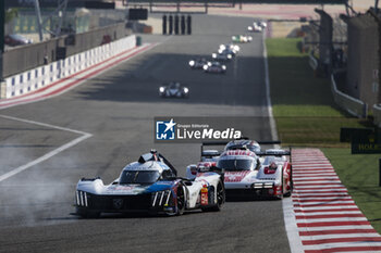 2023-11-04 - 94 DUVAL Loic (fra), MENEZES Gustavo (usa), MULLER Nico (swi), Peugeot TotalEnergies, Peugeot 9x8, action during the Bapco Energies WEC 8 Hours of Bahrain 2023, 7th round of the 2023 FIA World Endurance Championship, from November 1 to 4, 2023 on the Bahrain International Circuit, in Sakhir, Bahrain - AUTO - FIA WEC - 8 HOURS OF BAHRAIN 2023 - ENDURANCE - MOTORS