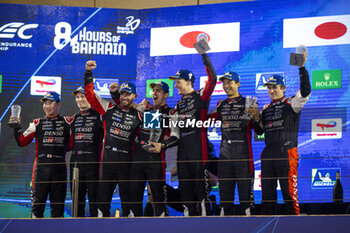2023-11-04 - 07 CONWAY Mike (gbr), KOBAYASHI Kamui (jpn), LOPEZ José Maria (arg), Toyota Gazoo Racing, Toyota GR010 - Hybrid, 08 BUEMI Sébastien (swi), HARTLEY Brendon (nzl), HIRAKAWA Ryo (jpn), Toyota Gazoo Racing, Toyota GR010 - Hybrid, Podium, portrait during the Bapco Energies WEC 8 Hours of Bahrain 2023, 7th round of the 2023 FIA World Endurance Championship, from November 1 to 4, 2023 on the Bahrain International Circuit, in Sakhir, Bahrain - AUTO - FIA WEC - 8 HOURS OF BAHRAIN 2023 - ENDURANCE - MOTORS