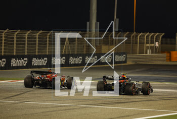 2023-03-05 - 11 PEREZ Sergio (mex), Red Bull Racing RB19, action with 16 LECLERC Charles (mco), Scuderia Ferrari SF-23 during the Formula 1 Gulf Air Bahrain Grand Prix 2023, 1st round of the 2023 FIA Formula One World Championship from March 2 to 5, 2023 on the Bahrain International Circuit, in Sakhir, Bahrain - F1 - BAHRAIN GRAND PRIX 2023 - RACE - FORMULA 1 - MOTORS