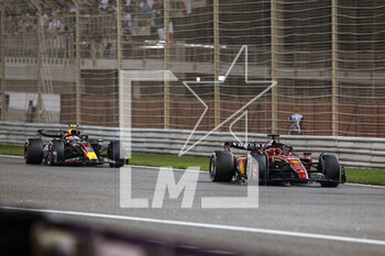 2023-03-05 - 16 LECLERC Charles (mco), Scuderia Ferrari SF-23, action 11 PEREZ Sergio (mex), Red Bull Racing RB19, action during the Formula 1 Gulf Air Bahrain Grand Prix 2023, 1st round of the 2023 FIA Formula One World Championship from March 2 to 5, 2023 on the Bahrain International Circuit, in Sakhir, Bahrain - F1 - BAHRAIN GRAND PRIX 2023 - RACE - FORMULA 1 - MOTORS