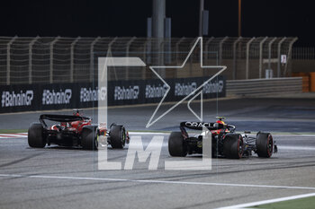 2023-03-05 - 16 LECLERC Charles (mco), Scuderia Ferrari SF-23, action 11 PEREZ Sergio (mex), Red Bull Racing RB19, action during the Formula 1 Gulf Air Bahrain Grand Prix 2023, 1st round of the 2023 FIA Formula One World Championship from March 2 to 5, 2023 on the Bahrain International Circuit, in Sakhir, Bahrain - F1 - BAHRAIN GRAND PRIX 2023 - RACE - FORMULA 1 - MOTORS
