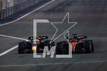 2023-03-05 - 11 PEREZ Sergio (mex), Red Bull Racing RB19, 16 LECLERC Charles (mco), Scuderia Ferrari SF-23, action during the Formula 1 Gulf Air Bahrain Grand Prix 2023, 1st round of the 2023 FIA Formula One World Championship from March 3 to 5, 2023 on the Bahrain International Circuit, in Sakhir, Bahrain - F1 - BAHRAIN GRAND PRIX 2023 - RACE - FORMULA 1 - MOTORS