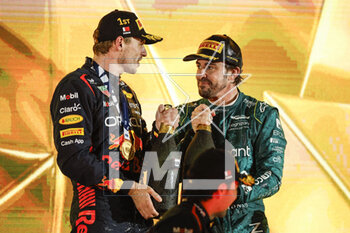 2023-03-05 - VERSTAPPEN Max (ned), Red Bull Racing RB19, portrait ALONSO Fernando (spa), Aston Martin F1 Team AMR23, portrait celebration podium during the Formula 1 Gulf Air Bahrain Grand Prix 2023, 1st round of the 2023 FIA Formula One World Championship from March 2 to 5, 2023 on the Bahrain International Circuit, in Sakhir, Bahrain - F1 - BAHRAIN GRAND PRIX 2023 - RACE - FORMULA 1 - MOTORS