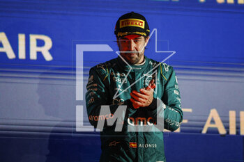 2023-03-05 - ALONSO Fernando (spa), Aston Martin F1 Team AMR23, portrait at the podium during the Formula 1 Gulf Air Bahrain Grand Prix 2023, 1st round of the 2023 FIA Formula One World Championship from March 2 to 5, 2023 on the Bahrain International Circuit, in Sakhir, Bahrain - F1 - BAHRAIN GRAND PRIX 2023 - RACE - FORMULA 1 - MOTORS