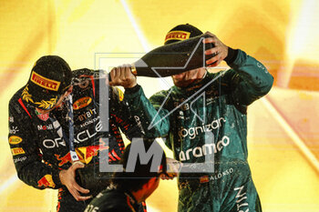 2023-03-05 - ALONSO Fernando (spa), Aston Martin F1 Team AMR23, portrait VERSTAPPEN Max (ned), Red Bull Racing RB19, portrait PEREZ Sergio (mex), Red Bull Racing RB19, portrait celebrates at the podium during the Formula 1 Gulf Air Bahrain Grand Prix 2023, 1st round of the 2023 FIA Formula One World Championship from March 2 to 5, 2023 on the Bahrain International Circuit, in Sakhir, Bahrain - F1 - BAHRAIN GRAND PRIX 2023 - RACE - FORMULA 1 - MOTORS