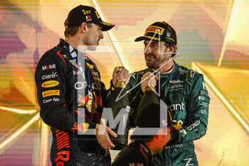 2023-03-05 - ALONSO Fernando (spa), Aston Martin F1 Team AMR23, portrait VERSTAPPEN Max (ned), Red Bull Racing RB19, portrait PEREZ Sergio (mex), Red Bull Racing RB19, portrait celebrates at the podium during the Formula 1 Gulf Air Bahrain Grand Prix 2023, 1st round of the 2023 FIA Formula One World Championship from March 2 to 5, 2023 on the Bahrain International Circuit, in Sakhir, Bahrain - F1 - BAHRAIN GRAND PRIX 2023 - RACE - FORMULA 1 - MOTORS