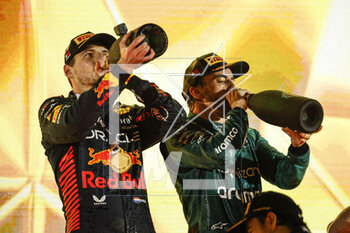 2023-03-05 - ALONSO Fernando (spa), Aston Martin F1 Team AMR23, portrait VERSTAPPEN Max (ned), Red Bull Racing RB19, portrait celebrates at the podium during the Formula 1 Gulf Air Bahrain Grand Prix 2023, 1st round of the 2023 FIA Formula One World Championship from March 2 to 5, 2023 on the Bahrain International Circuit, in Sakhir, Bahrain - F1 - BAHRAIN GRAND PRIX 2023 - RACE - FORMULA 1 - MOTORS