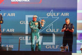 2023-03-05 - Fernando Alonso (SPA) Aston Martn AMR23 CELEBRATING ON PODIUM OF THE RACE of FORMULA 1 GULF AIR BAHRAIN GRAND PRIX 2023, SAKHIR, BAHRAIN, MARCH, 05 2023 - FORMULA 1 GULF AIR BAHRAIN GRAND PRIX 2023 - FORMULA 1 - MOTORS