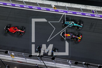 2023-03-19 - Start of the race: 11 PEREZ Sergio (mex), Red Bull Racing RB19, 14 ALONSO Fernando (spa), Aston Martin F1 Team AMR23, 55 SAINZ Carlos (spa), Scuderia Ferrari SF-23, 63 RUSSELL George (gbr), Mercedes AMG F1 Team W14, action during the Formula 1 STC Saudi Arabian Grand Prix 2023, 2nd round of the 2023 Formula One World Championship from March 17 to 19, 2023 on the Jeddah Corniche Circuit, in Jeddah, Saudi Arabia - F1 - SAUDI ARABIAN GRAND PRIX 2023 - RACE - FORMULA 1 - MOTORS