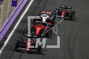 2023-03-19 - 24 ZHOU Guanyu (chi), Alfa Romeo F1 Team Stake C43, action 16 LECLERC Charles (mco), Scuderia Ferrari SF-23, action 20 MAGNUSSEN Kevin (den), Haas F1 Team VF-23 Ferrari, action 77 BOTTAS Valtteri (fin), Alfa Romeo F1 Team Stake C43, action during the Formula 1 STC Saudi Arabian Grand Prix 2023, 2nd round of the 2023 Formula One World Championship from March 17 to 19, 2023 on the Jeddah Corniche Circuit, in Jeddah, Saudi Arabia - F1 - SAUDI ARABIAN GRAND PRIX 2023 - RACE - FORMULA 1 - MOTORS