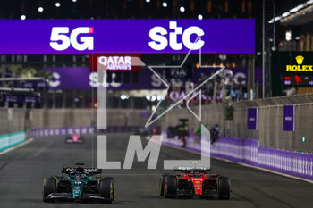 2023-03-19 - 18 STROLL Lance (can), Aston Martin F1 Team AMR23, action 55 SAINZ Carlos (spa), Scuderia Ferrari SF-23, action during the Formula 1 STC Saudi Arabian Grand Prix 2023, 2nd round of the 2023 Formula One World Championship from March 17 to 19, 2023 on the Jeddah Corniche Circuit, in Jeddah, Saudi Arabia - F1 - SAUDI ARABIAN GRAND PRIX 2023 - RACE - FORMULA 1 - MOTORS