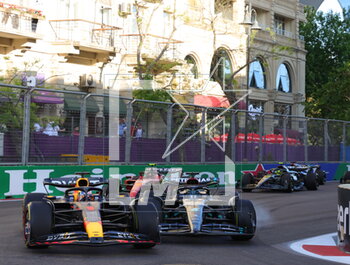 2023-04-29 - 01 VERSTAPPEN Max (nld), Red Bull Racing RB19, action 63 RUSSELL George (gbr), Mercedes AMG F1 Team W14, action during the Formula 1 Azerbaijan Grand Prix 2023, 4th round of the 2023 Formula One World Championship from April 28 to 30, 2023 on the Baku City Circuit, in Baku, Azerbaijan - F1 - AZERBAIJAN GRAND PRIX 2023 - FORMULA 1 - MOTORS