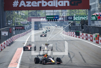 2023-04-30 - 16 LECLERC Charles (mco), Scuderia Ferrari SF-23, action with 11 PEREZ Sergio (mex), Red Bull Racing RB19 during the Formula 1 Azerbaijan Grand Prix 2023, 4th round of the 2023 Formula One World Championship from April 28 to 30, 2023 on the Baku City Circuit, in Baku, Azerbaijan - F1 - AZERBAIJAN GRAND PRIX 2023 - RACE - FORMULA 1 - MOTORS