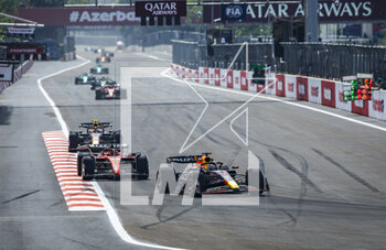 2023-04-30 - 01 VERSTAPPEN Max (nld), Red Bull Racing RB19, action with 16 LECLERC Charles (mco), Scuderia Ferrari SF-23 during the Formula 1 Azerbaijan Grand Prix 2023, 4th round of the 2023 Formula One World Championship from April 28 to 30, 2023 on the Baku City Circuit, in Baku, Azerbaijan - F1 - AZERBAIJAN GRAND PRIX 2023 - RACE - FORMULA 1 - MOTORS
