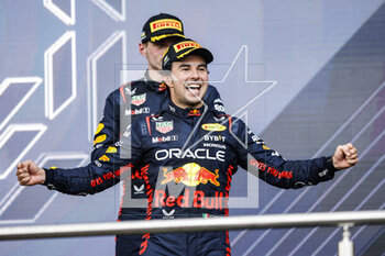 2023-04-30 - PEREZ Sergio (mex), Red Bull Racing RB19, portrait celebrates his victory, win at the podium during the Formula 1 Azerbaijan Grand Prix 2023, 4th round of the 2023 Formula One World Championship from April 28 to 30, 2023 on the Baku City Circuit, in Baku, Azerbaijan - F1 - AZERBAIJAN GRAND PRIX 2023 - RACE - FORMULA 1 - MOTORS