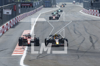 2023-04-30 - 16 LECLERC Charles (mco), Scuderia Ferrari SF-23, action 11 PEREZ Sergio (mex), Red Bull Racing RB19, action during the Formula 1 Azerbaijan Grand Prix 2023, 4th round of the 2023 Formula One World Championship from April 28 to 30, 2023 on the Baku City Circuit, in Baku, Azerbaijan - F1 - AZERBAIJAN GRAND PRIX 2023 - RACE - FORMULA 1 - MOTORS