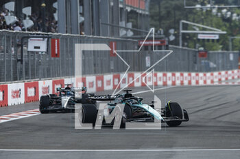 2023-04-30 - 18 STROLL Lance (can), Aston Martin F1 Team AMR23, action 63 RUSSELL George (gbr), Mercedes AMG F1 Team W14, action during the Formula 1 Azerbaijan Grand Prix 2023, 4th round of the 2023 Formula One World Championship from April 28 to 30, 2023 on the Baku City Circuit, in Baku, Azerbaijan - F1 - AZERBAIJAN GRAND PRIX 2023 - RACE - FORMULA 1 - MOTORS