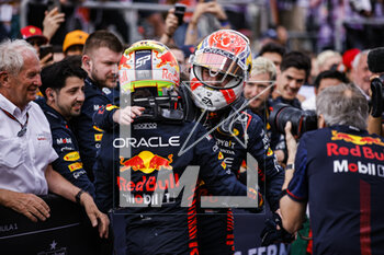 2023-04-30 - PEREZ Sergio (mex), Red Bull Racing RB19, portrait celebrating the victory VERSTAPPEN Max (ned), Red Bull Racing RB19, portrait during the Formula 1 Azerbaijan Grand Prix 2023, 4th round of the 2023 Formula One World Championship from April 28 to 30, 2023 on the Baku City Circuit, in Baku, Azerbaijan - F1 - AZERBAIJAN GRAND PRIX 2023 - RACE - FORMULA 1 - MOTORS