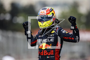 2023-04-30 - PEREZ Sergio (mex), Red Bull Racing RB19, portrait celebrates the victory during the Formula 1 Azerbaijan Grand Prix 2023, 4th round of the 2023 Formula One World Championship from April 28 to 30, 2023 on the Baku City Circuit, in Baku, Azerbaijan - F1 - AZERBAIJAN GRAND PRIX 2023 - RACE - FORMULA 1 - MOTORS