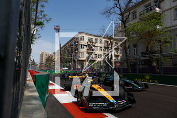 2023-04-30 - 04 NORRIS Lando (gbr), McLaren F1 Team MCL60, action 18 STROLL Lance (can), Aston Martin F1 Team AMR23, action during the Formula 1 Azerbaijan Grand Prix 2023, 4th round of the 2023 Formula One World Championship from April 28 to 30, 2023 on the Baku City Circuit, in Baku, Azerbaijan - F1 - AZERBAIJAN GRAND PRIX 2023 - RACE - FORMULA 1 - MOTORS