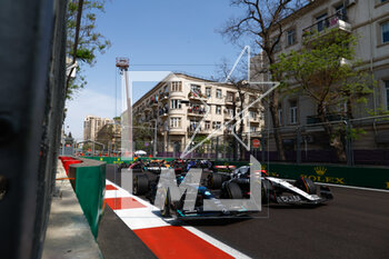 2023-04-30 - 63 RUSSELL George (gbr), Mercedes AMG F1 Team W14, action 22 TSUNODA Yuki (jap), Scuderia AlphaTauri AT04, action during the Formula 1 Azerbaijan Grand Prix 2023, 4th round of the 2023 Formula One World Championship from April 28 to 30, 2023 on the Baku City Circuit, in Baku, Azerbaijan - F1 - AZERBAIJAN GRAND PRIX 2023 - RACE - FORMULA 1 - MOTORS