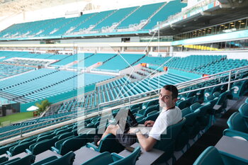 2023-05-04 - Antonin Vincent working alone in the grandstands during the Formula 1 Crypto.com Miami Grand Prix 2023, 5th round of the 2023 Formula One World Championship from May 05 to 07, 2023 on the Miami International Autodrome, in Miami Gardens, Florida, United States of America - F1 - MIAMI GRAND PRIX 2023 - FORMULA 1 - MOTORS