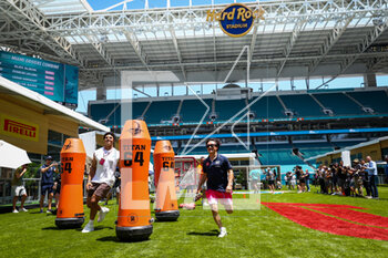 2023-05-04 - TSUNODA Yuki (jap), Scuderia AlphaTauri AT04, playing football with Miami Dolphins football players during the Formula 1 Crypto.com Miami Grand Prix 2023, 5th round of the 2023 Formula One World Championship from May 05 to 07, 2023 on the Miami International Autodrome, in Miami Gardens, Florida, United States of America - F1 - MIAMI GRAND PRIX 2023 - FORMULA 1 - MOTORS