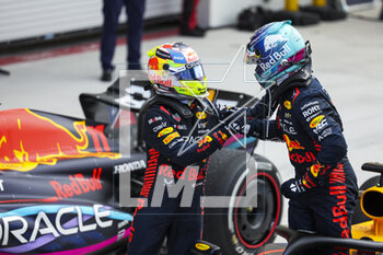 2023-05-07 - VERSTAPPEN Max (ned), Red Bull Racing RB19 being congratulated by PEREZ Sergio (mex), Red Bull Racing RB19, portrait for his win during the Formula 1 Crypto.com Miami Grand Prix 2023, 5th round of the 2023 Formula One World Championship from May 05 to 07, 2023 on the Miami International Autodrome, in Miami Gardens, Florida, United States of America - F1 - MIAMI GRAND PRIX 2023 - RACE - FORMULA 1 - MOTORS