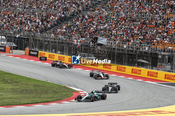 2023-06-04 - 14 ALONSO Fernando (spa), Aston Martin F1 Team AMR23, action 63 RUSSELL George (gbr), Mercedes AMG F1 Team W14, action 27 HULKENBERG Nico (ger), Haas F1 Team VF-23 Ferrari, action during the Formula 1 AWS Gran Premio de Espana 2023, 7th round of the 2023 Formula One World Championship from June 2 to 4, 2023 on the Circuit de Barcelona-Catalunya, in Montmelo, Spain - F1 - SPANISH GRAND PRIX 2023 - RACE - FORMULA 1 - MOTORS