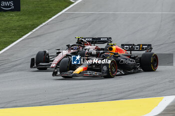 2023-06-04 - 11 PEREZ Sergio (mex), Red Bull Racing RB19, action 24 ZHOU Guanyu (chi), Alfa Romeo F1 Team Stake C43, action during the Formula 1 AWS Gran Premio de Espana 2023, 7th round of the 2023 Formula One World Championship from June 2 to 4, 2023 on the Circuit de Barcelona-Catalunya, in Montmelo, Spain - F1 - SPANISH GRAND PRIX 2023 - RACE - FORMULA 1 - MOTORS