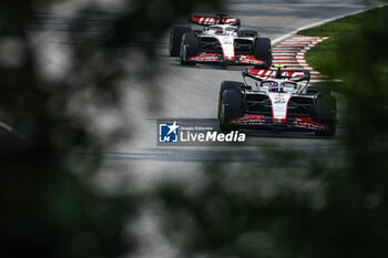 2023-06-16 - 27 HULKENBERG Nico (ger), Haas F1 Team VF-23 Ferrari, action 20 MAGNUSSEN Kevin (den), Haas F1 Team VF-23 Ferrari, action during the Formula 1 Pirelli Grand Prix du Canada, 8th round of the 2023 Formula One World Championship from June 16 to 18, 2023 on the Circuit Gilles Villeneuve, in Montréal, Canada - F1 - CANADIAN GRAND PRIX 2023 - FORMULA 1 - MOTORS