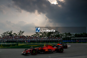 2023-06-16 - 16 LECLERC Charles (mco), Scuderia Ferrari SF-23, action 11 PEREZ Sergio (mex), Red Bull Racing RB19, action during the Formula 1 Pirelli Grand Prix du Canada, 8th round of the 2023 Formula One World Championship from June 16 to 18, 2023 on the Circuit Gilles Villeneuve, in Montréal, Canada - F1 - CANADIAN GRAND PRIX 2023 - FORMULA 1 - MOTORS