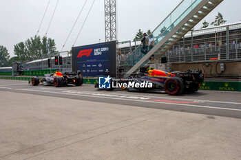2023-06-16 - Max Verstappen (NED) Redbull Racing RB19 and Sergio Perez (MEX) Redbull Racing RB19 exiting pitlane
during day2, Friday, of FORMULA 1 PIRELLI GRAND PRIX DU CANADA 2023 - from 15th to 18th June 2023 in Montreal, Quebec, Canada - FORMULA 1 PIRELLI GRAND PRIX DU CANADA 2023 - FORMULA 1 - MOTORS