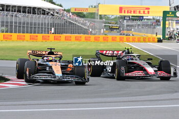 2023-06-18 - 81 PIASTRI Oscar (aus), McLaren F1 Team MCL60, action 27 HULKENBERG Nico (ger), Haas F1 Team VF-23 Ferrari, action during the Formula 1 Pirelli Grand Prix du Canada, 8th round of the 2023 Formula One World Championship from June 16 to 18, 2023 on the Circuit Gilles Villeneuve, in Montréal, Canada - F1 - CANADIAN GRAND PRIX 2023 - RACE - FORMULA 1 - MOTORS