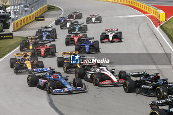 2023-06-18 - start of the race, depart, 31 OCON Esteban (fra), Alpine F1 Team A523, action 27 HULKENBERG Nico (ger), Haas F1 Team VF-23 Ferrari, action during the Formula 1 Pirelli Grand Prix du Canada, 8th round of the 2023 Formula One World Championship from June 16 to 18, 2023 on the Circuit Gilles Villeneuve, in Montréal, Canada - F1 - CANADIAN GRAND PRIX 2023 - RACE - FORMULA 1 - MOTORS