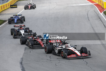 2023-06-18 - 20 MAGNUSSEN Kevin (den), Haas F1 Team VF-23 Ferrari, action 77 BOTTAS Valtteri (fin), Alfa Romeo F1 Team Stake C43, action 21 DE VRIES Nyck (ned), Scuderia AlphaTauri AT04, action during the Formula 1 Pirelli Grand Prix du Canada, 8th round of the 2023 Formula One World Championship from June 16 to 18, 2023 on the Circuit Gilles Villeneuve, in Montréal, Canada - F1 - CANADIAN GRAND PRIX 2023 - RACE - FORMULA 1 - MOTORS