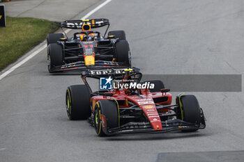 2023-06-18 - 55 SAINZ Carlos (spa), Scuderia Ferrari SF-23, action 11 PEREZ Sergio (mex), Red Bull Racing RB19, action during the Formula 1 Pirelli Grand Prix du Canada, 8th round of the 2023 Formula One World Championship from June 16 to 18, 2023 on the Circuit Gilles Villeneuve, in Montréal, Canada - F1 - CANADIAN GRAND PRIX 2023 - RACE - FORMULA 1 - MOTORS