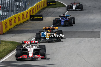 2023-06-18 - 20 MAGNUSSEN Kevin (den), Haas F1 Team VF-23 Ferrari, action 81 PIASTRI Oscar (aus), McLaren F1 Team MCL60, action 23 ALBON Alexander (tha), Williams Racing FW45, action during the Formula 1 Pirelli Grand Prix du Canada, 8th round of the 2023 Formula One World Championship from June 16 to 18, 2023 on the Circuit Gilles Villeneuve, in Montréal, Canada - F1 - CANADIAN GRAND PRIX 2023 - RACE - FORMULA 1 - MOTORS