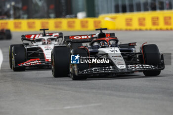 2023-06-18 - 21 DE VRIES Nyck (ned), Scuderia AlphaTauri AT04, action 20 MAGNUSSEN Kevin (den), Haas F1 Team VF-23 Ferrari, action during the Formula 1 Pirelli Grand Prix du Canada, 8th round of the 2023 Formula One World Championship from June 16 to 18, 2023 on the Circuit Gilles Villeneuve, in Montréal, Canada - F1 - CANADIAN GRAND PRIX 2023 - RACE - FORMULA 1 - MOTORS