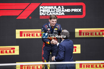 2023-06-18 - VERSTAPPEN Max (ned), Red Bull Racing RB19, portrait celebrates Red Bull's 100th victory podium DOMENICALI Stefano (ita), Chairman and CEO Formula One Group FOG, portrait during the Formula 1 Pirelli Grand Prix du Canada, 8th round of the 2023 Formula One World Championship from June 16 to 18, 2023 on the Circuit Gilles Villeneuve, in Montréal, Canada - F1 - CANADIAN GRAND PRIX 2023 - RACE - FORMULA 1 - MOTORS