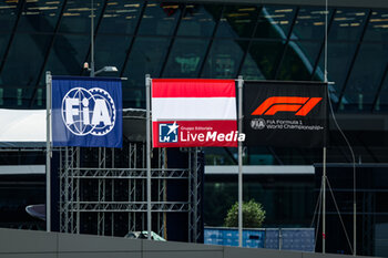 2023-06-30 - FIA logo & flag of Austria during the 2023 Formula 1 Rolex Grosser Preis von Osterreich, 2023 Austrian Grand Prix, 9th round of the 2023 Formula One World Championship from June 30 to July 2, 2023 on the Red Bull Ring, in Spielberg, Austria - F1 - AUSTRIAN GRAND PRIX 2023 - FORMULA 1 - MOTORS
