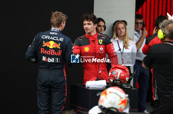 2023-06-30 - VERSTAPPEN Max (ned), Red Bull Racing RB19, portrait celebrates his pole position with LECLERC Charles (mco), Scuderia Ferrari SF-23, portrait during the 2023 Formula 1 Rolex Grosser Preis von Osterreich, 2023 Austrian Grand Prix, 9th round of the 2023 Formula One World Championship from June 30 to July 2, 2023 on the Red Bull Ring, in Spielberg, Austria - F1 - AUSTRIAN GRAND PRIX 2023 - FORMULA 1 - MOTORS