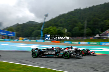 2023-07-01 - 63 RUSSELL George (gbr), Mercedes AMG F1 Team W14, 27 HULKENBERG Nico (ger), Haas F1 Team VF-23 Ferrari, action during the 2023 Formula 1 Rolex Grosser Preis von Osterreich, 2023 Austrian Grand Prix, 9th round of the 2023 Formula One World Championship from June 30 to July 2, 2023 on the Red Bull Ring, in Spielberg, Austria - F1 - AUSTRIAN GRAND PRIX 2023 - FORMULA 1 - MOTORS